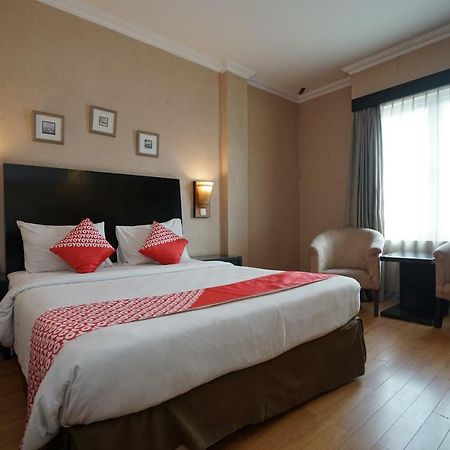 Capital O 1128 Hotel Imara Palembang Eksteriør bilde