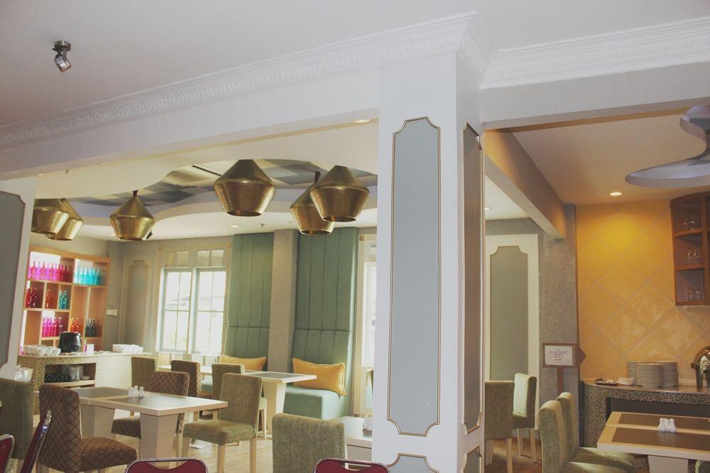 Capital O 1128 Hotel Imara Palembang Eksteriør bilde