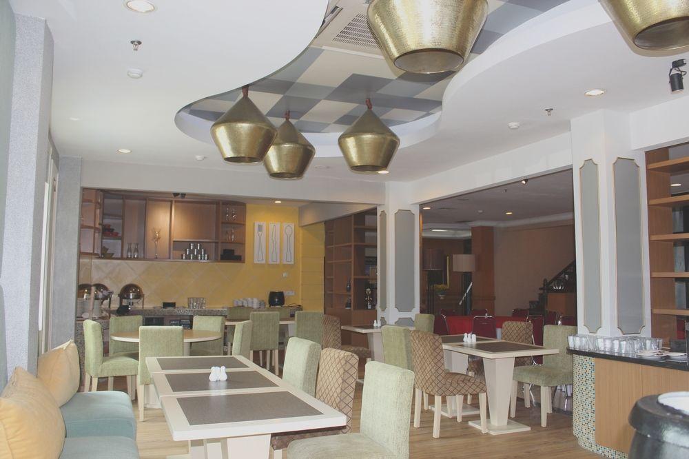 Capital O 1128 Hotel Imara Palembang Eksteriør bilde
