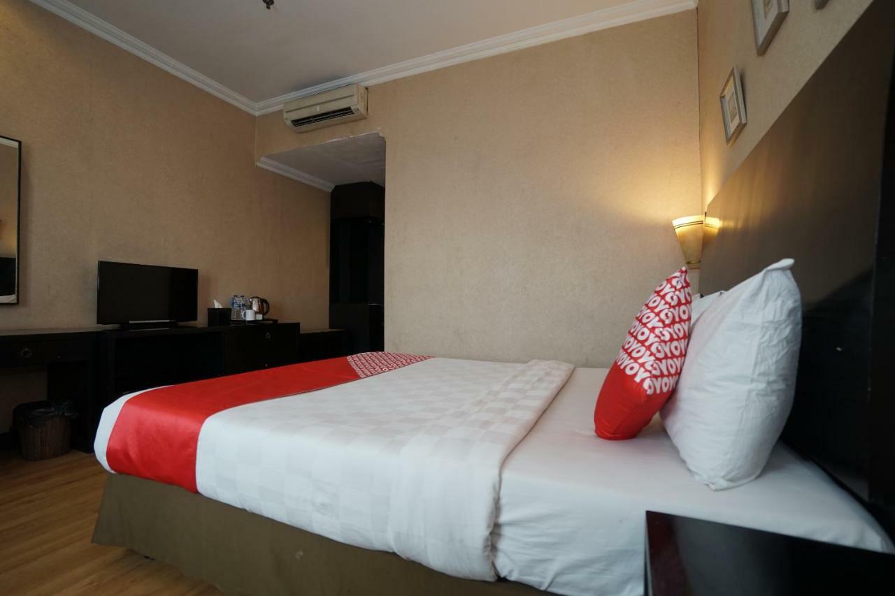 Capital O 1128 Hotel Imara Palembang Eksteriør bilde