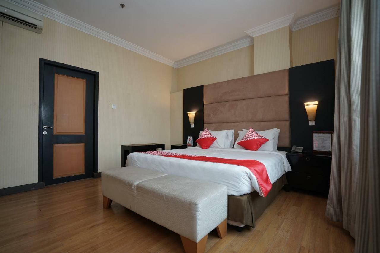 Capital O 1128 Hotel Imara Palembang Eksteriør bilde