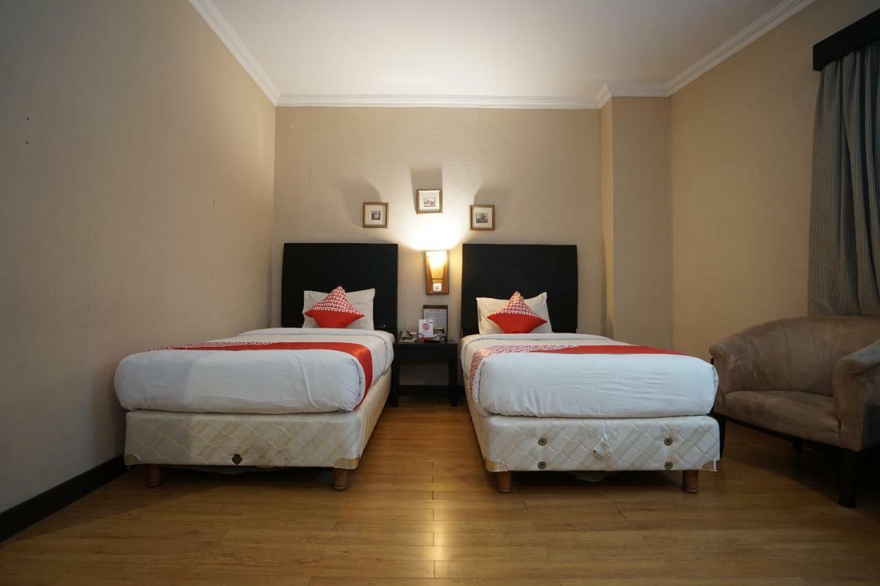 Capital O 1128 Hotel Imara Palembang Eksteriør bilde