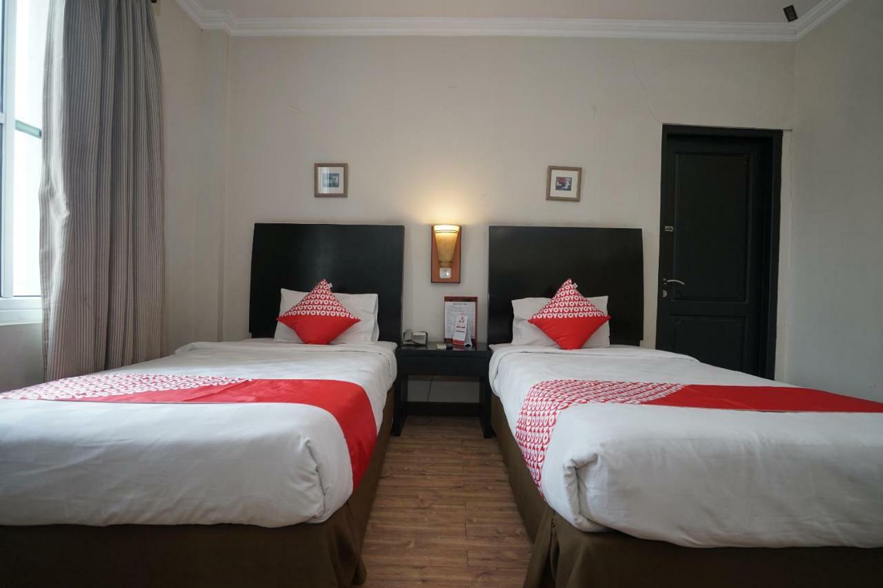 Capital O 1128 Hotel Imara Palembang Eksteriør bilde