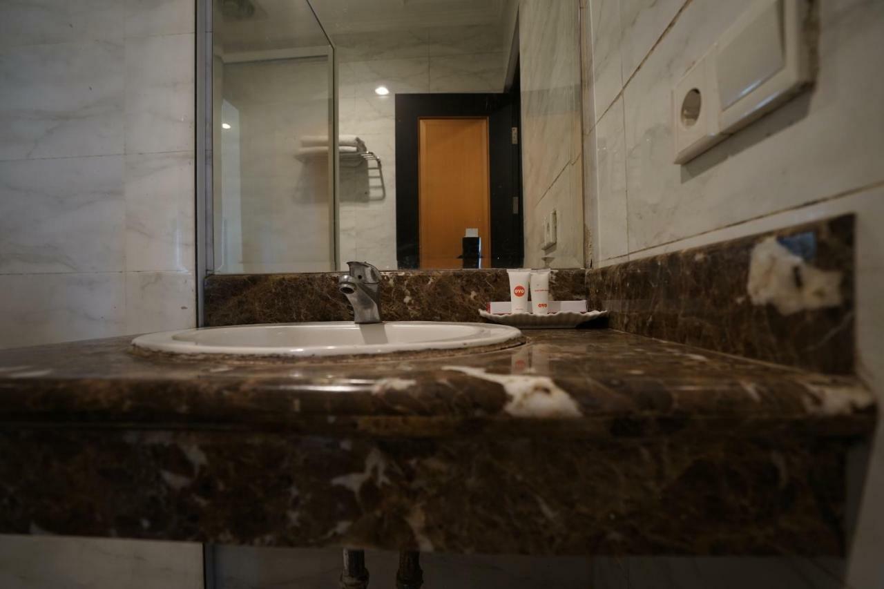 Capital O 1128 Hotel Imara Palembang Eksteriør bilde