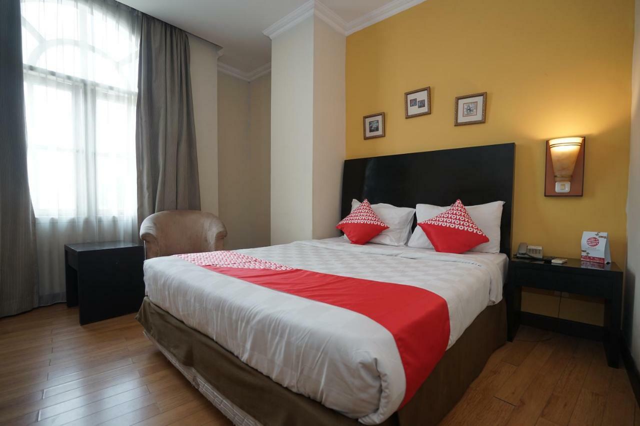Capital O 1128 Hotel Imara Palembang Eksteriør bilde