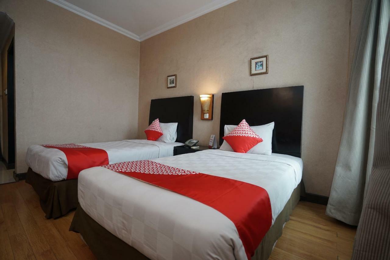 Capital O 1128 Hotel Imara Palembang Eksteriør bilde