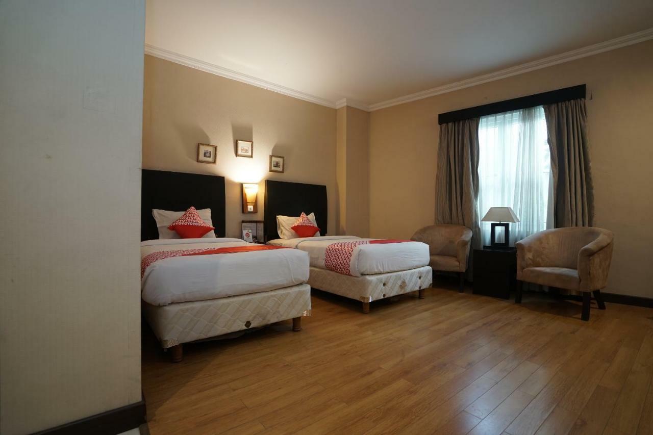 Capital O 1128 Hotel Imara Palembang Eksteriør bilde