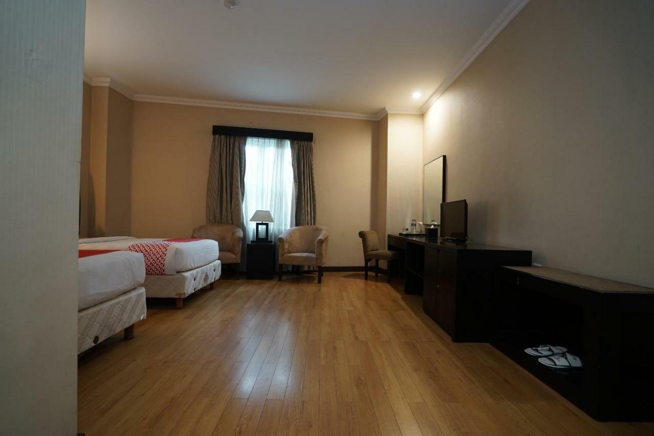 Capital O 1128 Hotel Imara Palembang Eksteriør bilde