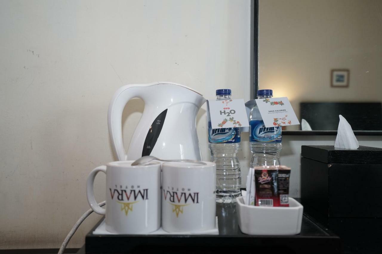 Capital O 1128 Hotel Imara Palembang Eksteriør bilde