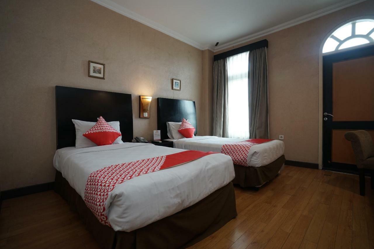 Capital O 1128 Hotel Imara Palembang Eksteriør bilde