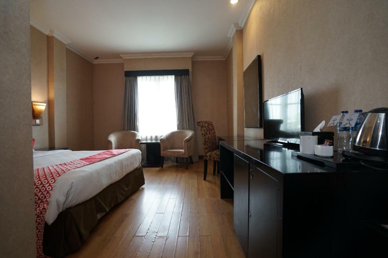 Capital O 1128 Hotel Imara Palembang Eksteriør bilde