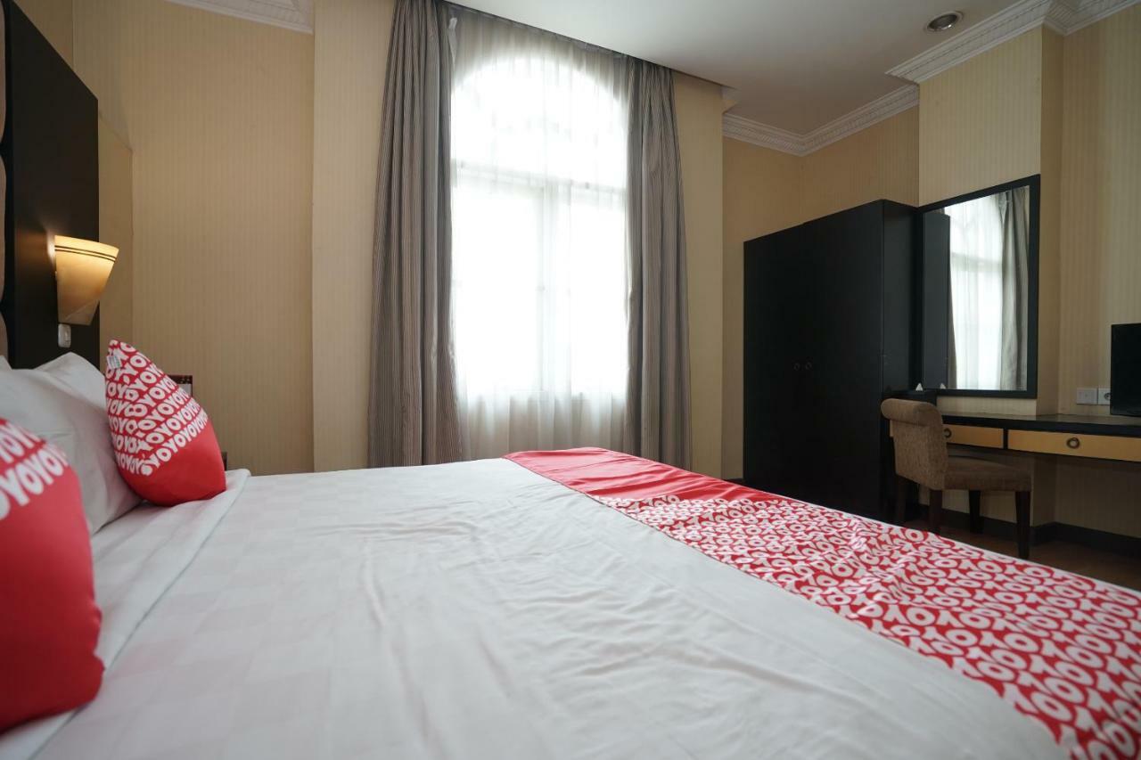 Capital O 1128 Hotel Imara Palembang Eksteriør bilde