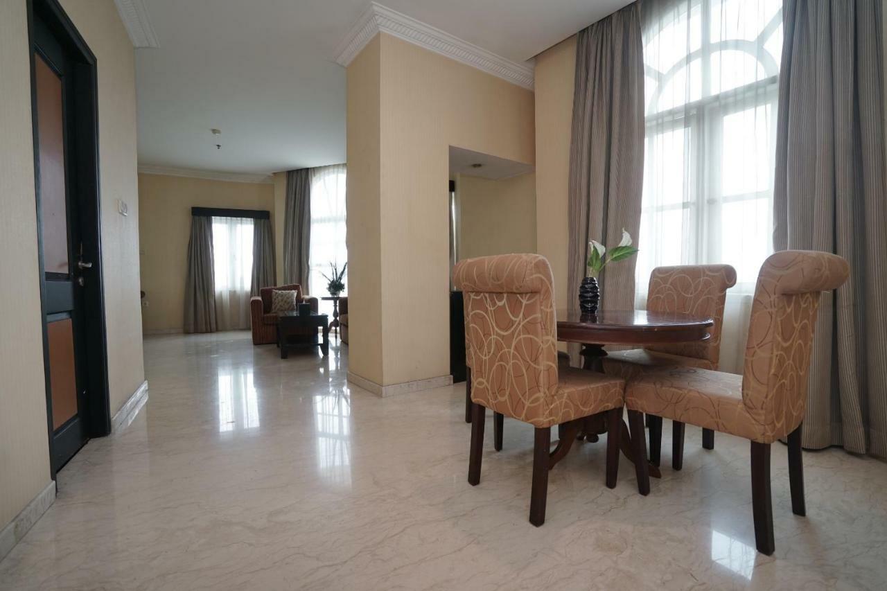 Capital O 1128 Hotel Imara Palembang Eksteriør bilde