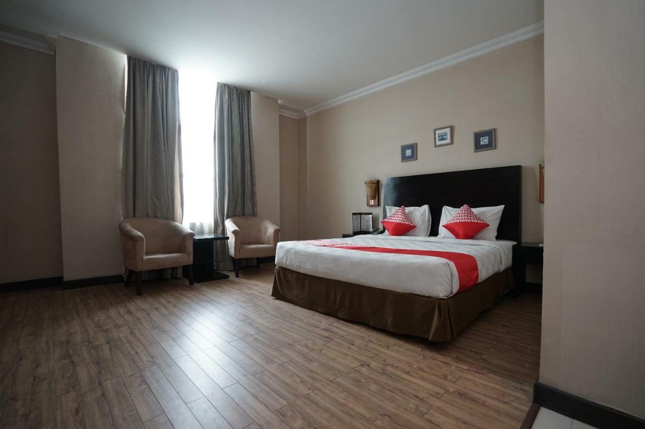 Capital O 1128 Hotel Imara Palembang Eksteriør bilde
