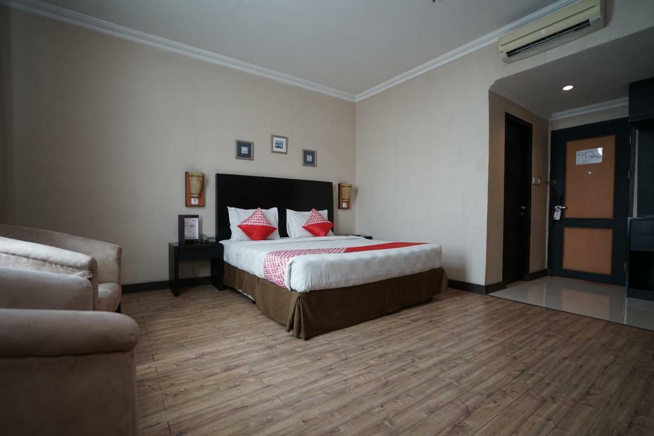 Capital O 1128 Hotel Imara Palembang Eksteriør bilde