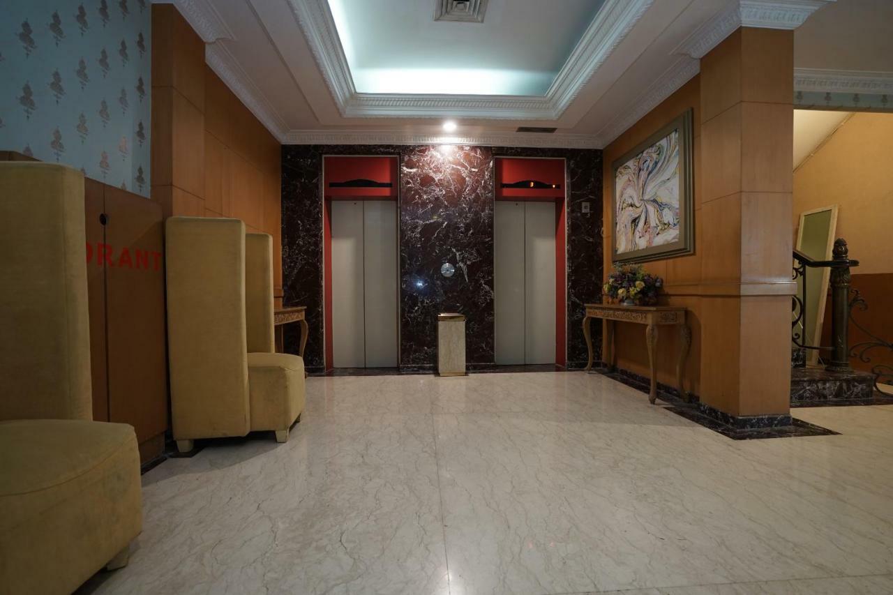 Capital O 1128 Hotel Imara Palembang Eksteriør bilde