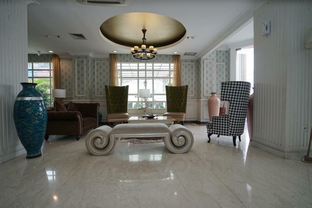 Capital O 1128 Hotel Imara Palembang Eksteriør bilde