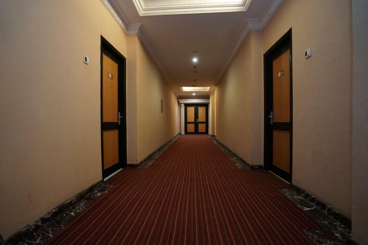 Capital O 1128 Hotel Imara Palembang Eksteriør bilde