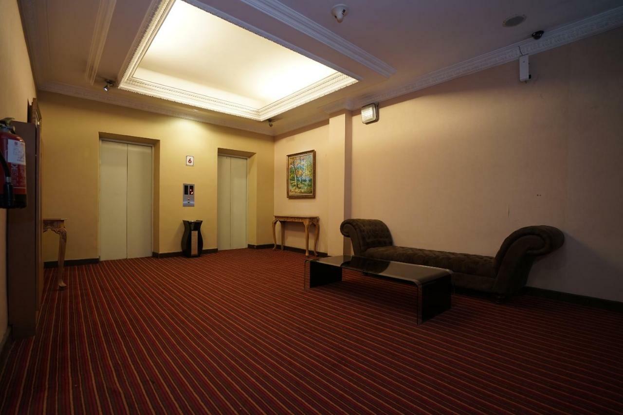 Capital O 1128 Hotel Imara Palembang Eksteriør bilde