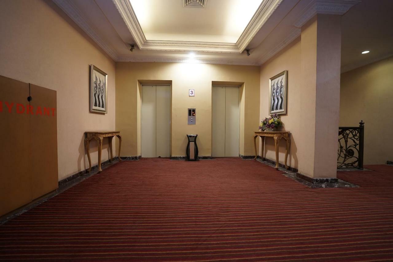 Capital O 1128 Hotel Imara Palembang Eksteriør bilde