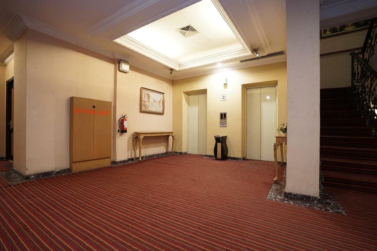 Capital O 1128 Hotel Imara Palembang Eksteriør bilde