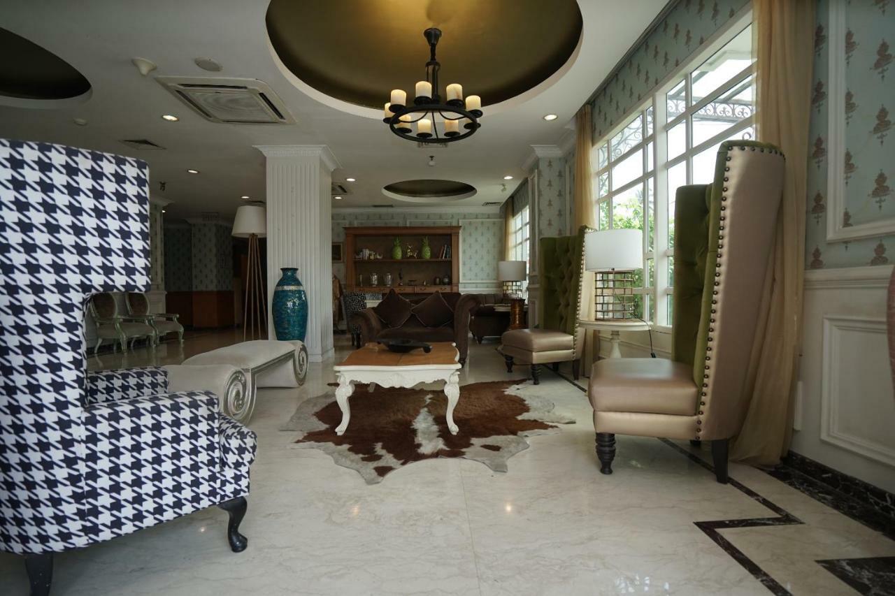 Capital O 1128 Hotel Imara Palembang Eksteriør bilde