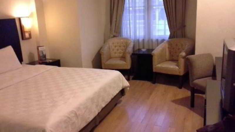 Capital O 1128 Hotel Imara Palembang Eksteriør bilde